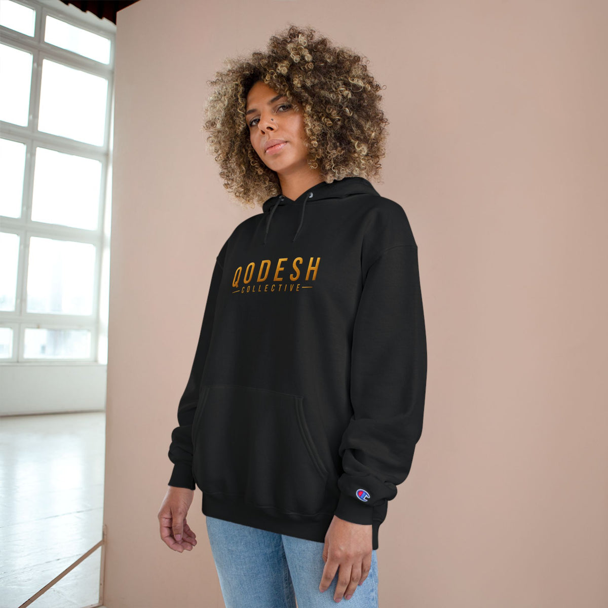 Qodesh Collective Champion Hoodie — Black Pullover with Lamb Crest Logo